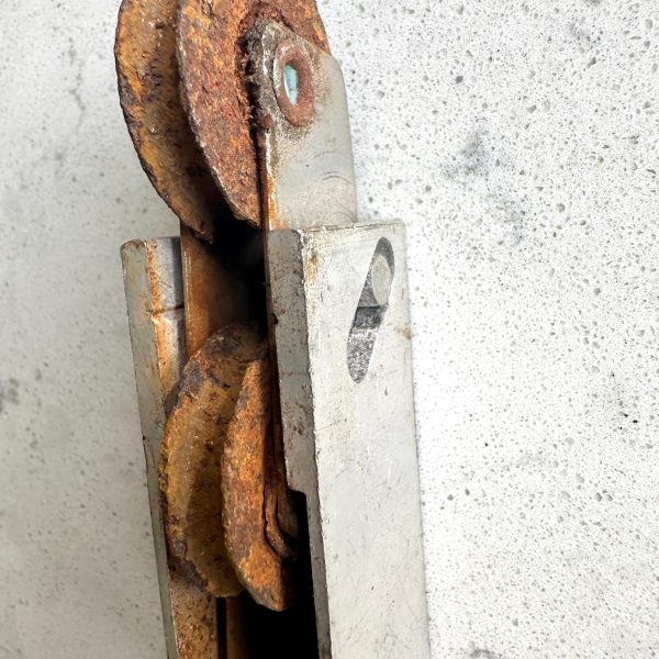 Rusted sliding glass door wheel